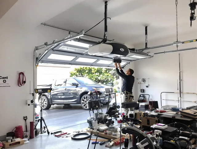 Hamden Garage Door Repair specialist installing smart garage door opener system in Hamden home