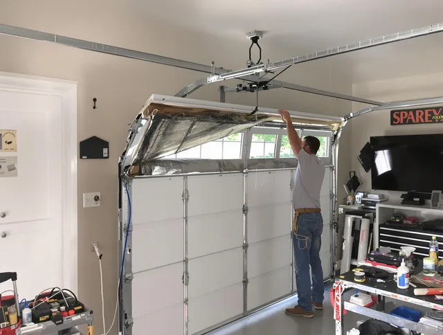 Garage door section replacement by Hamden Garage Door Repair in Hamden