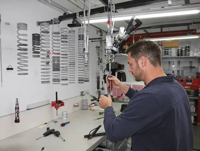 Hamden Garage Door Repair safety certified technician performing precision spring replacement in Hamden