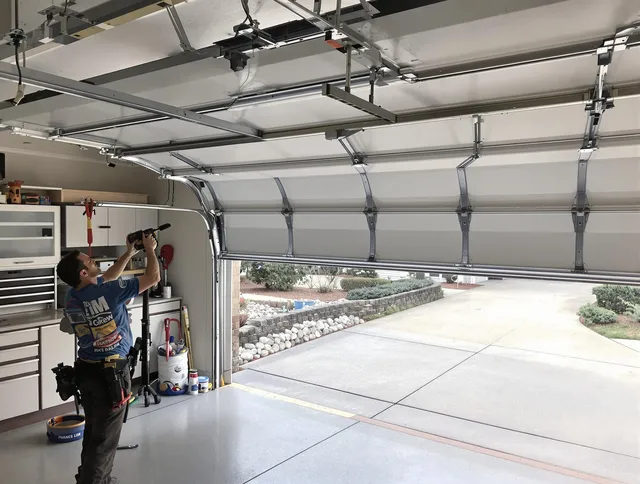 Garage door track repair service by Hamden Garage Door Repair in Hamden